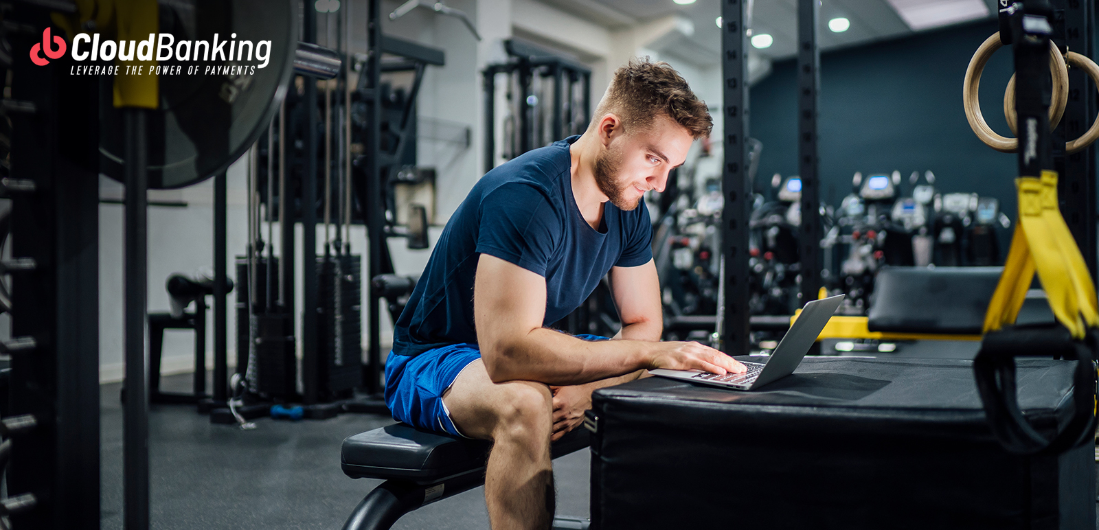 person transacting online while at the gym